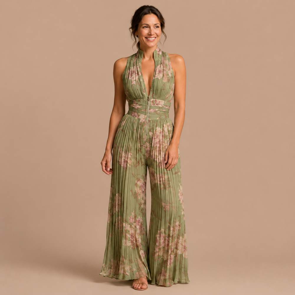 Front view of the Sabina pleated V-neck women's jumpsuit in a vibrant green, perfect for summer styling.