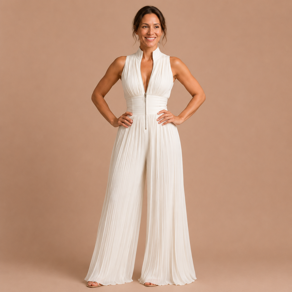 Overhead shot of the complete Sabina women's jumpsuit, displaying its pleated texture and overall cut.