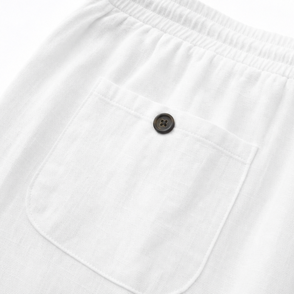 Detailed close-up of the natural texture of the cotton-linen blend in the capri trousers.