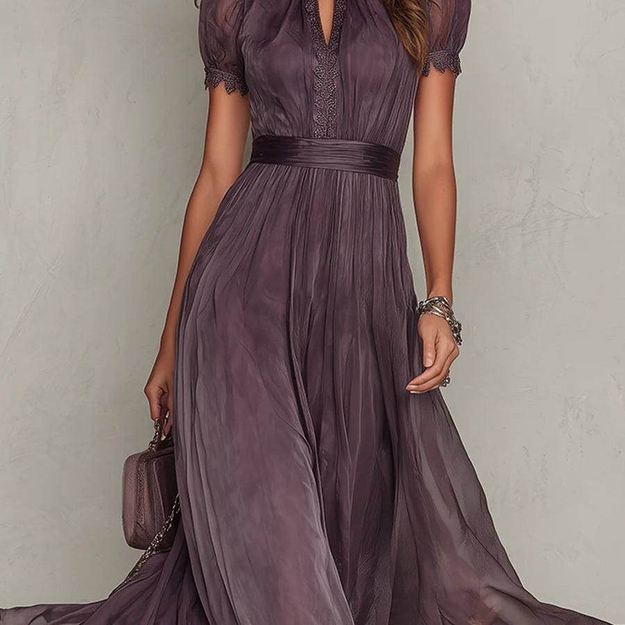Back view of the purple flowing chiffon lace maxi dress, showing the drape of the fabric and the full length.