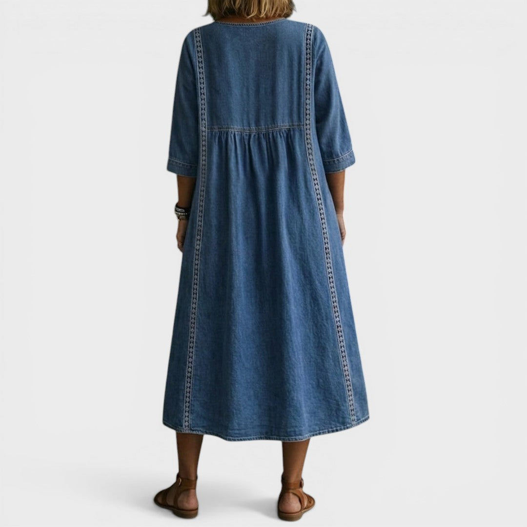 Side profile of a woman wearing the Audrey loose-fit denim jeans, highlighting the silhouette.