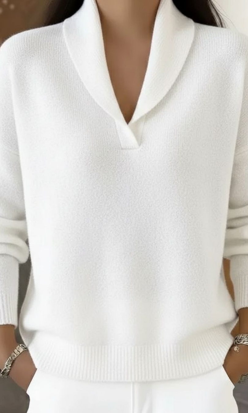 Back view of Elina knit pants in white, illustrating the flow and full length of the comfortable garment.