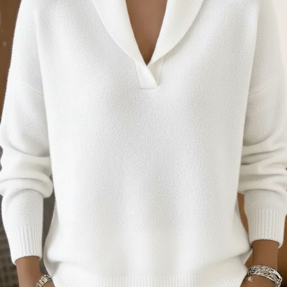 Back view of Elina knit pants in white, illustrating the flow and full length of the comfortable garment.