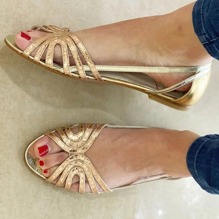 Side profile of a Kaelen vintage sandal in bluish green, highlighting the comfortable sole and strap design.