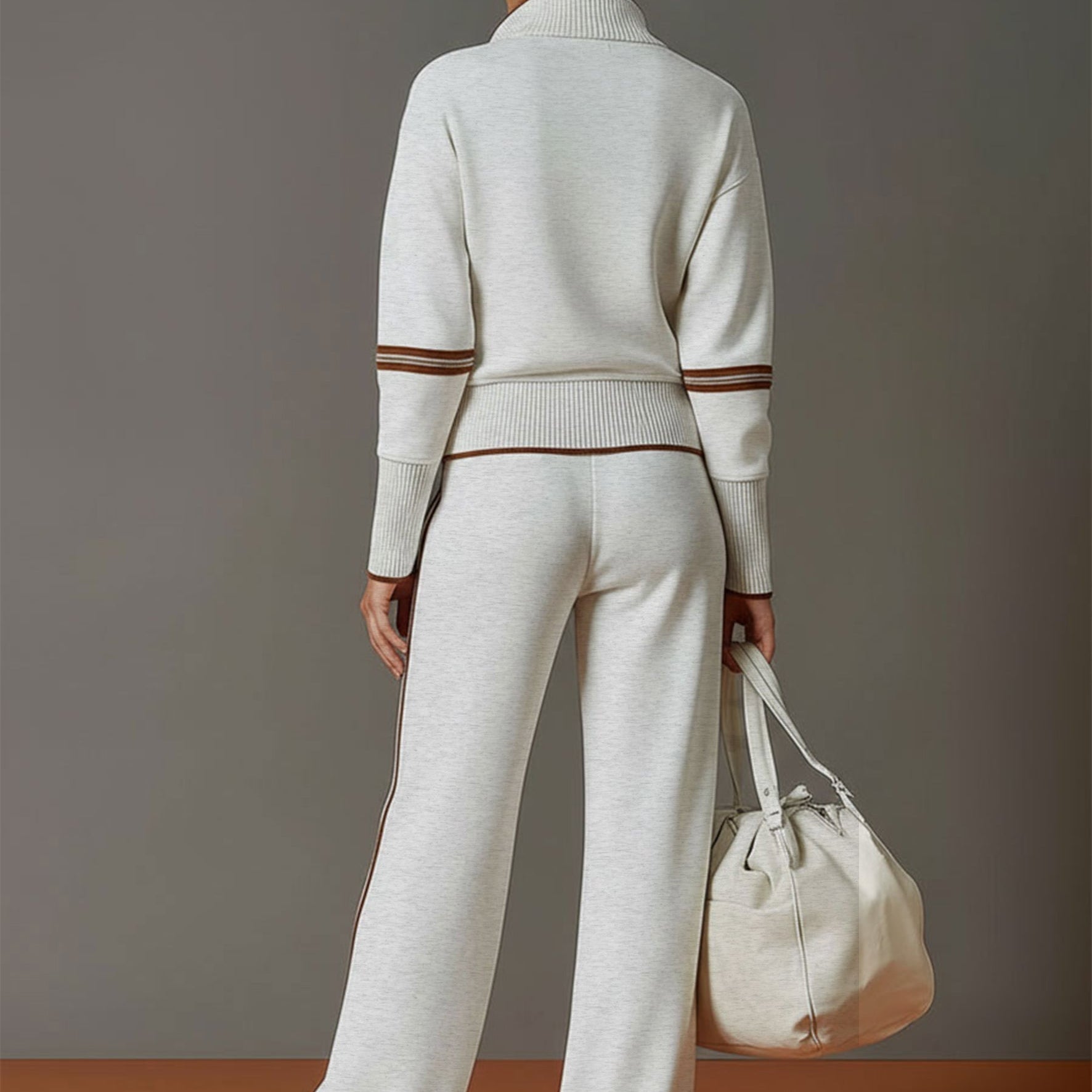 Woman posing in a studio setting, emphasizing the versatile styling of the wide-leg pants.