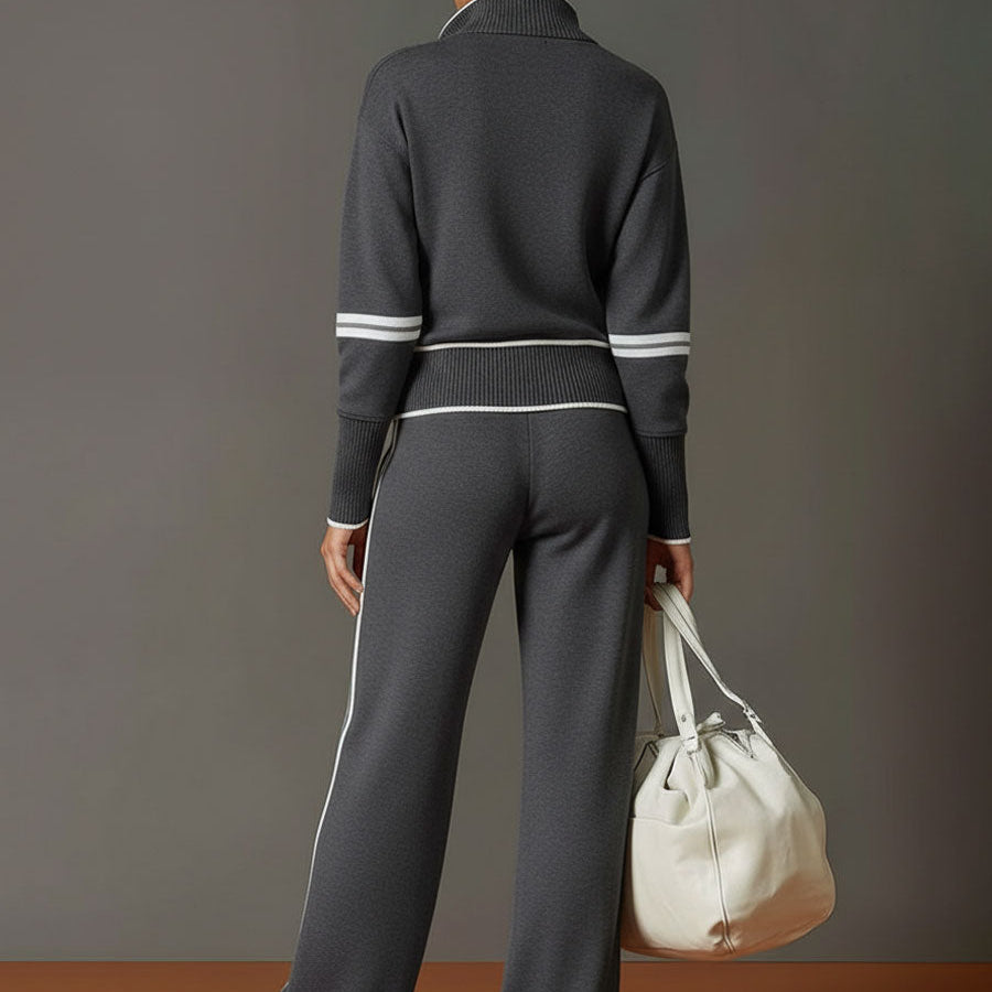 Close-up of the fabric's soft feel, demonstrating the premium quality of the wide-leg pants material.