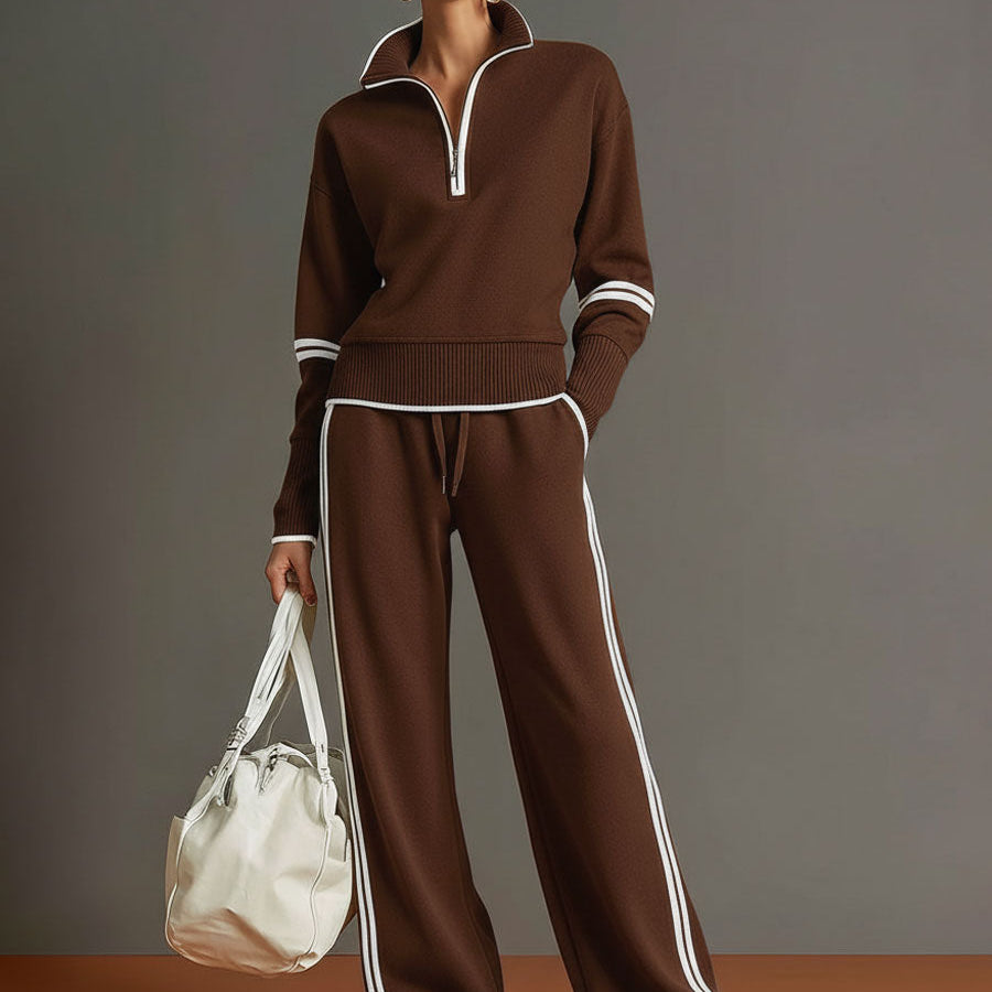Lifestyle shot of a woman walking outdoors, illustrating the graceful movement of the wide-leg pants.