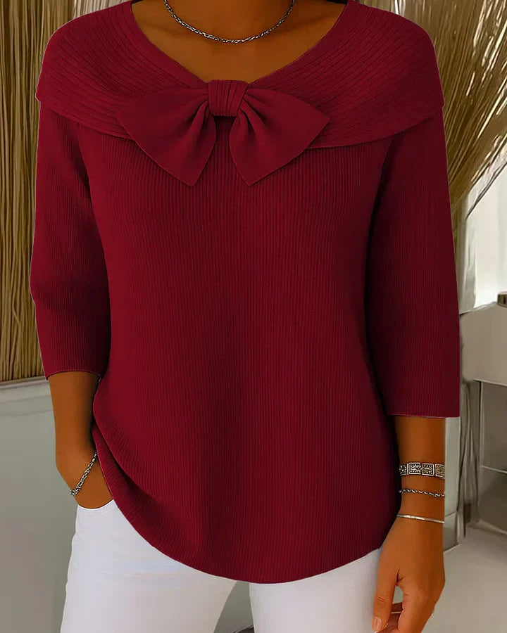 Back view of the Lana elegant knit tunic, emphasizing its relaxed silhouette and comfortable design.