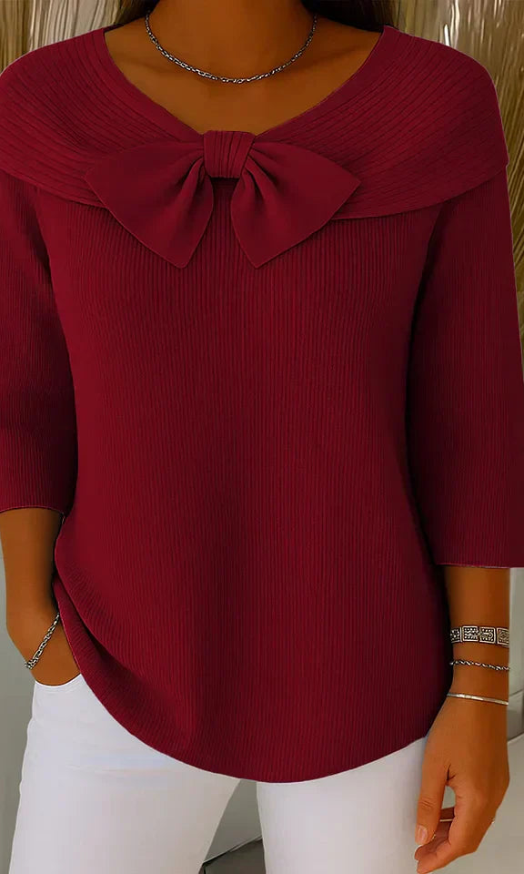 Back view of the Lana elegant knit tunic, emphasizing its relaxed silhouette and comfortable design.