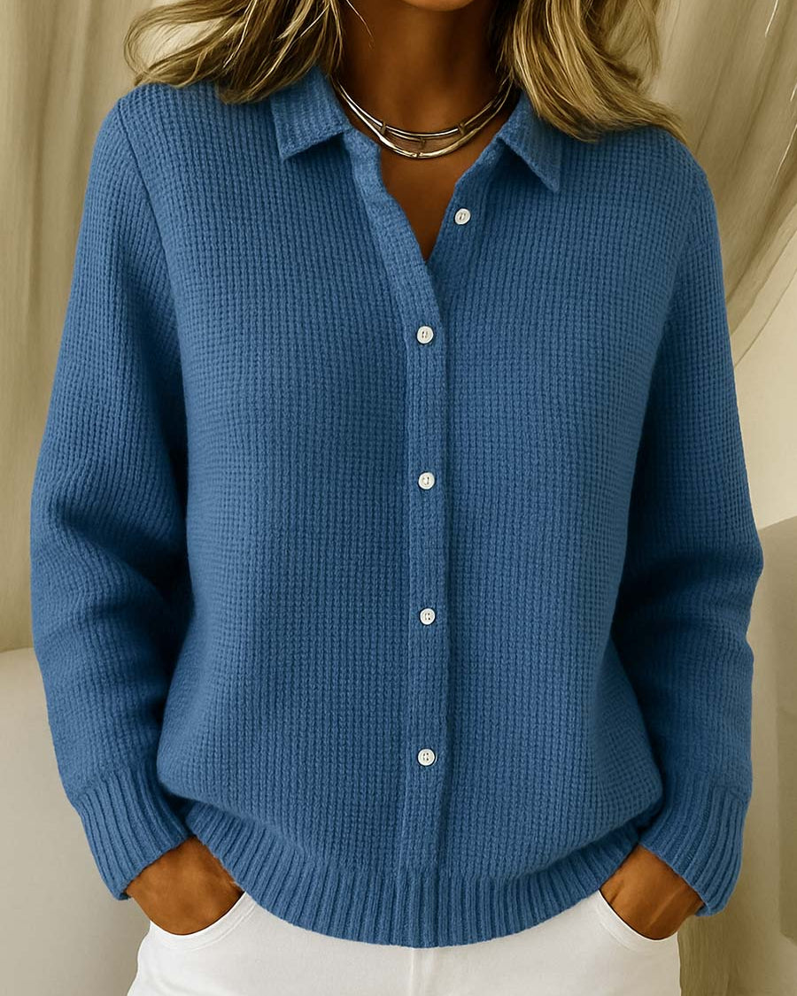 Side profile of a woman wearing the Lila Classic Button-Up Cardigan, highlighting its loose fit and how it drapes comfortably.