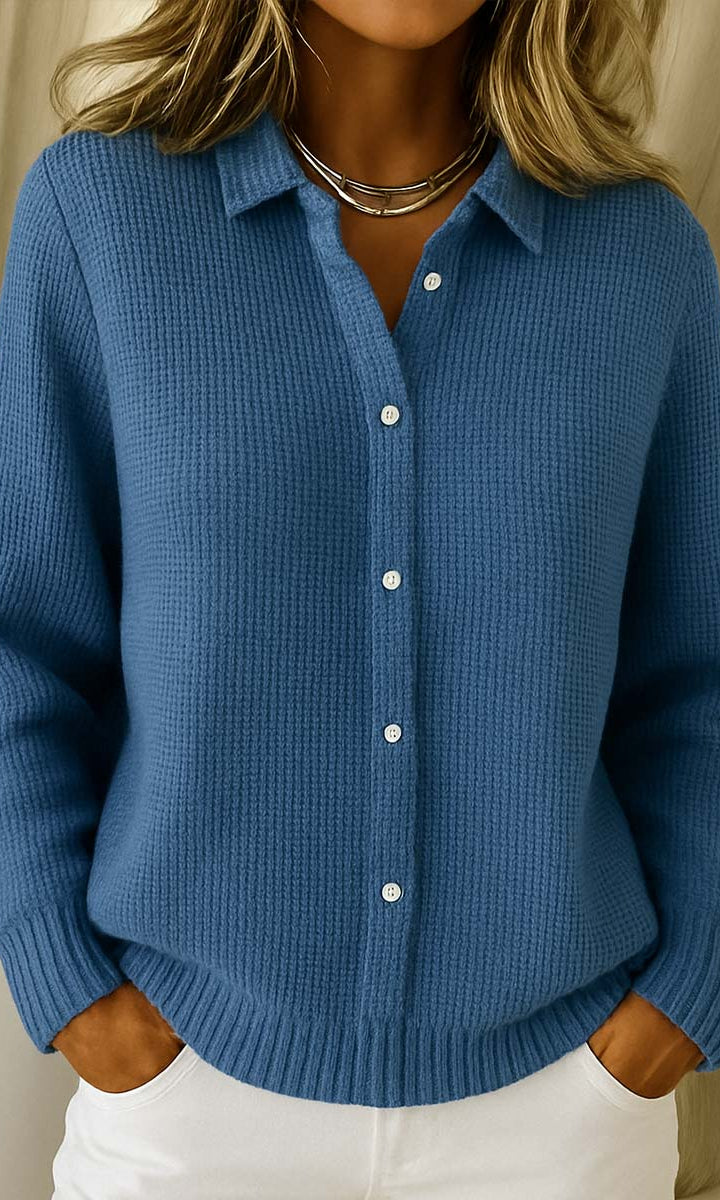 Side profile of a woman wearing the Lila Classic Button-Up Cardigan, highlighting its loose fit and how it drapes comfortably.