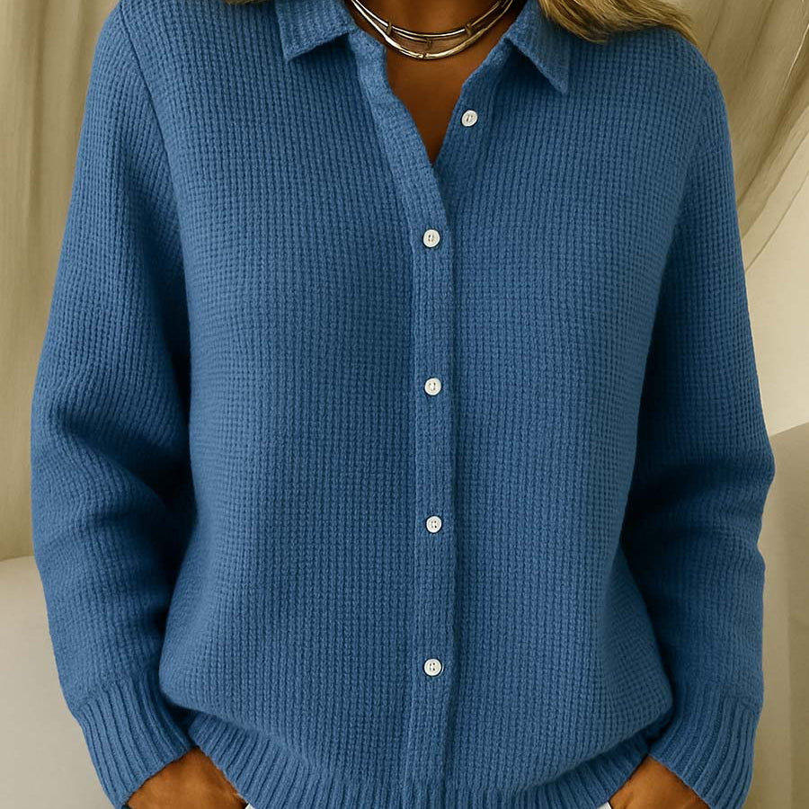 Side profile of a woman wearing the Lila Classic Button-Up Cardigan, highlighting its loose fit and how it drapes comfortably.