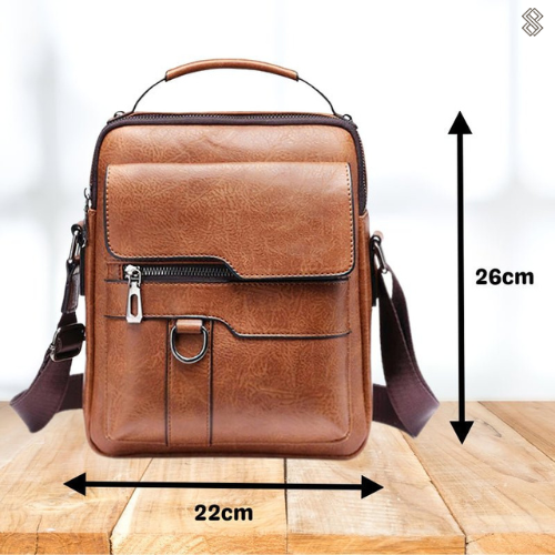 Back view of the dark brown Milo shoulder bag, showing its sleek profile and comfortable fit against a casual outfit.