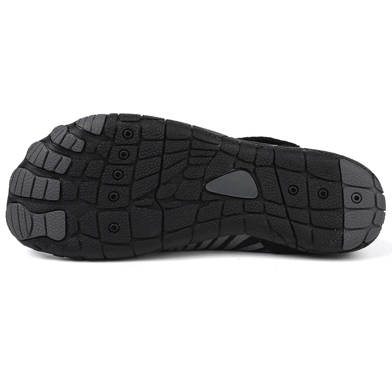 Black Maeve comfort orthopedic shoes, showcasing the flexibility of the sole.