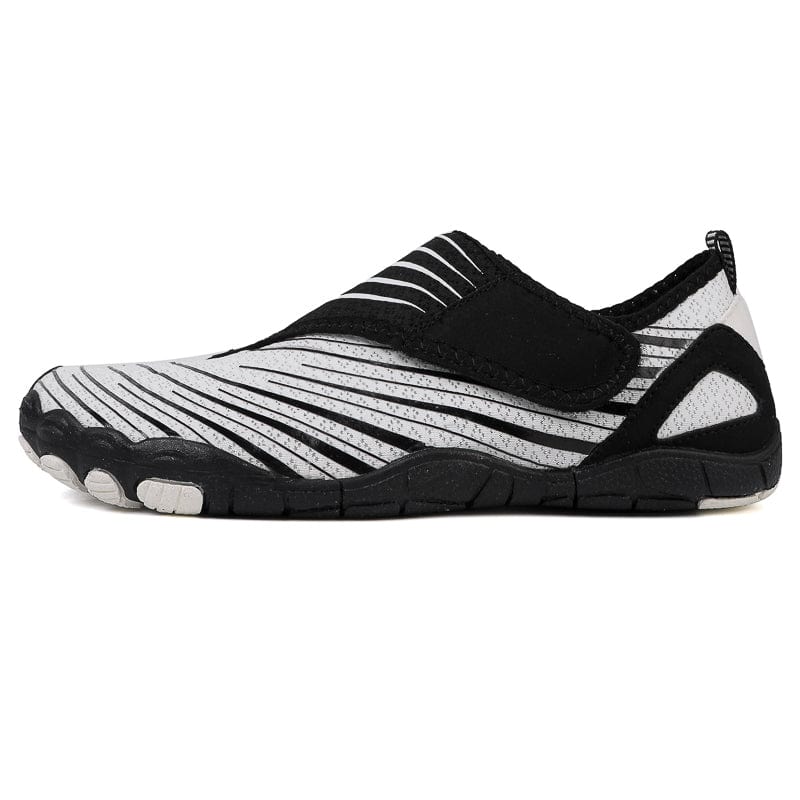 Beige Maeve comfort orthopedic shoes, demonstrating ease of cleaning with a wipe.