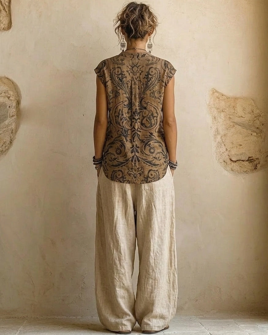 Close-up detail of the fabric texture and relaxed cut of the breathable cotton and linen pants on a model.