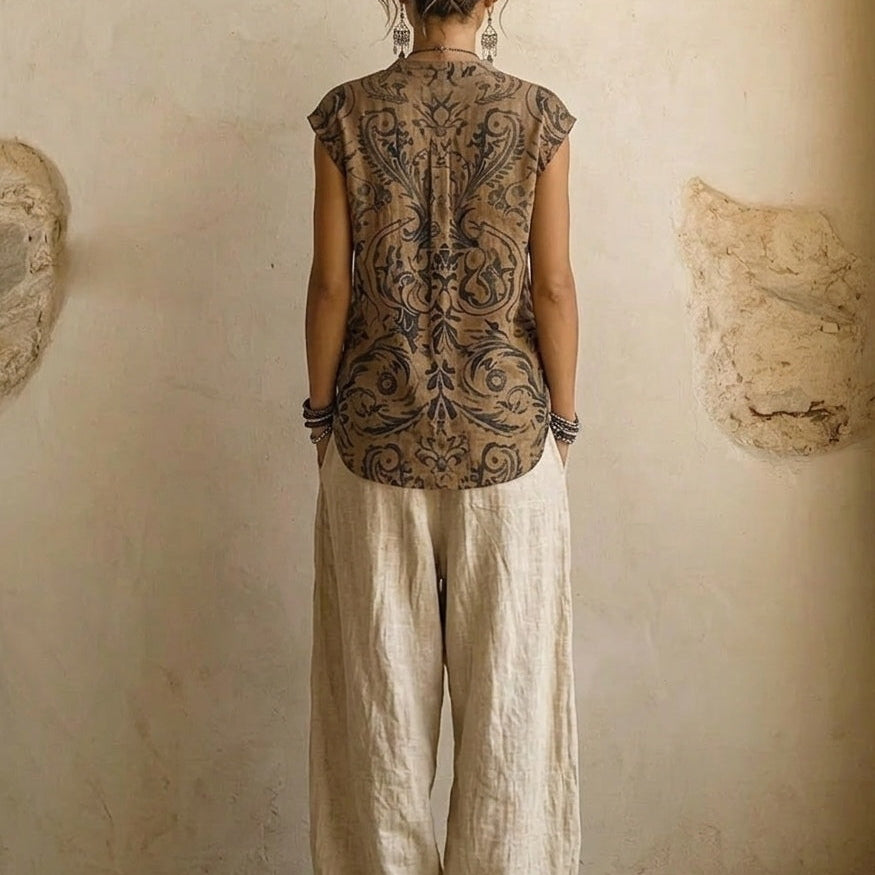 Close-up detail of the fabric texture and relaxed cut of the breathable cotton and linen pants on a model.