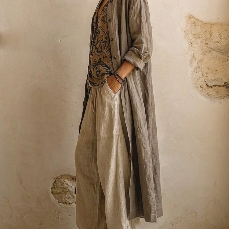 Full-body shot of a woman in the comfortable relaxed fit pants, styled for a chic and relaxed outdoor look.