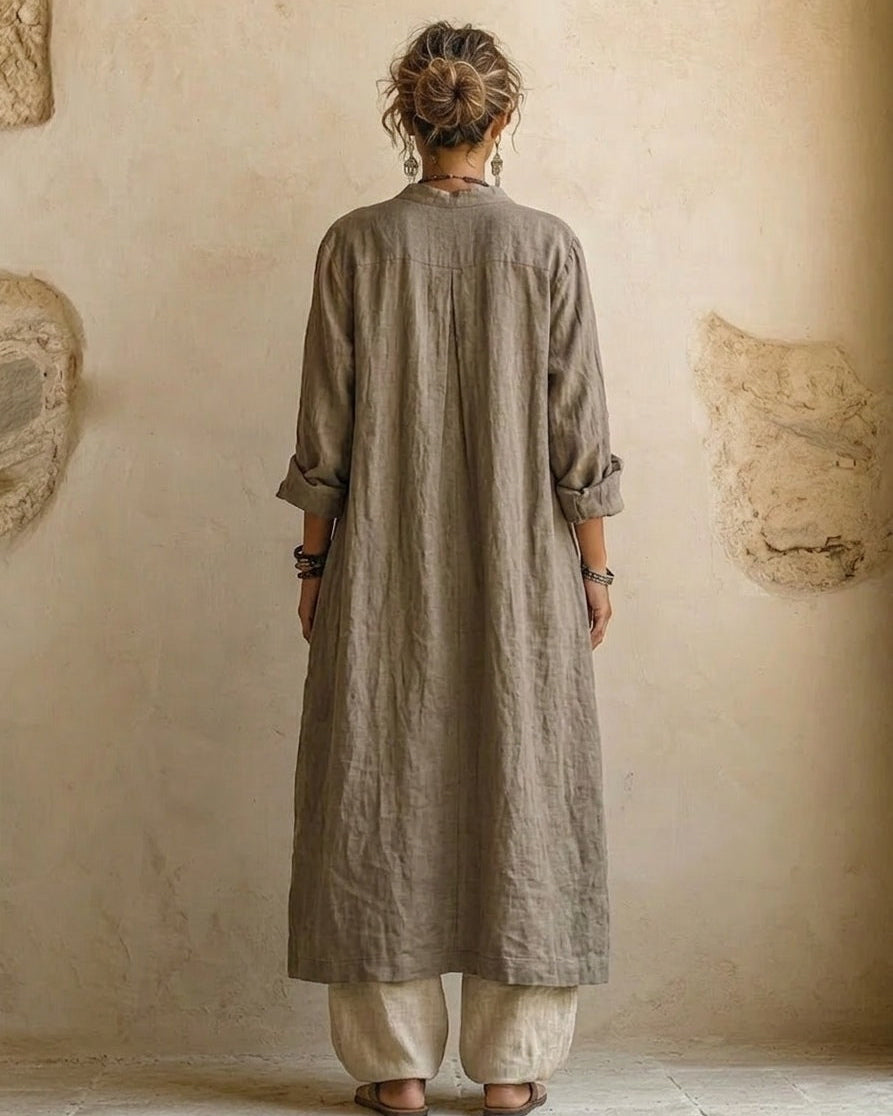 Back view of the elegant relaxed fit pants, highlighting the drape and overall silhouette, perfect for warm weather.