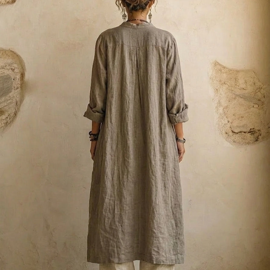 Back view of the elegant relaxed fit pants, highlighting the drape and overall silhouette, perfect for warm weather.