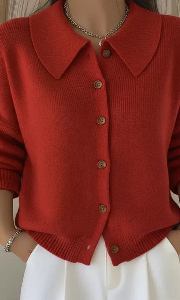 Side profile of the Marlow loose-fit cardigan, highlighting its relaxed drape and smooth texture.