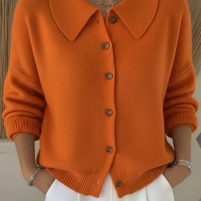 Close-up detail of the classic button closure on the front of the Marlow everyday cardigan.