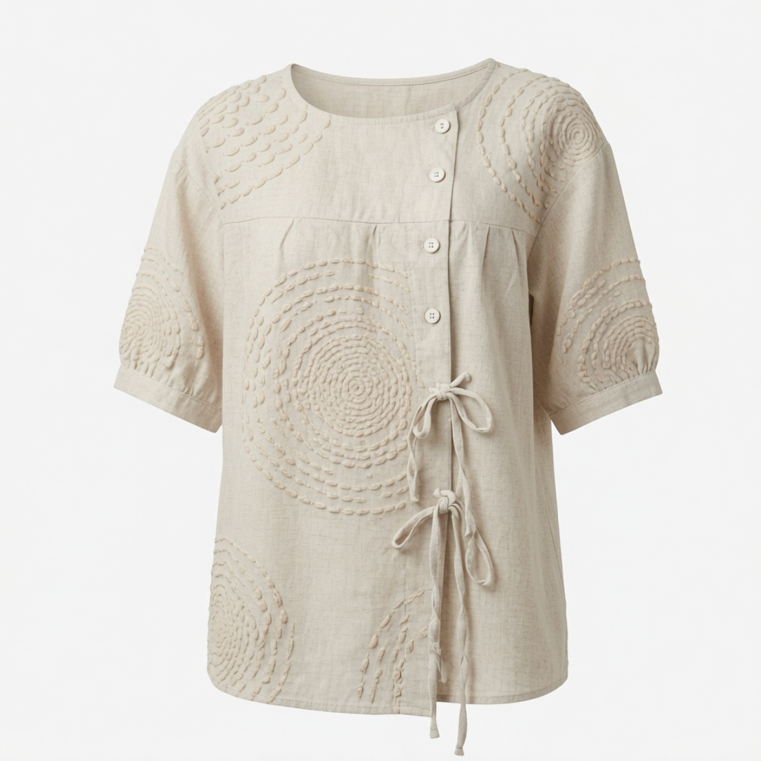Side profile of the Mirabelle casual top on a model, highlighting the adjustable drawstring tie at the hip.