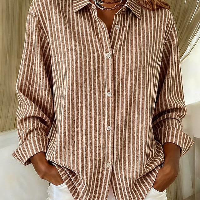 Close-up detail of the button closure and classic collar on the Nina relaxed fit shirt.