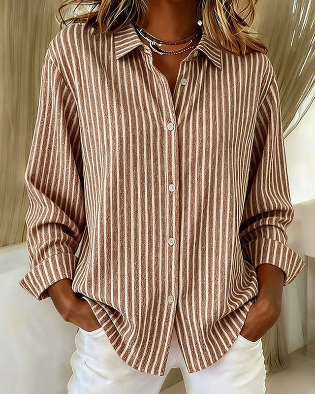 Close-up detail of the button closure and classic collar on the Nina relaxed fit shirt.