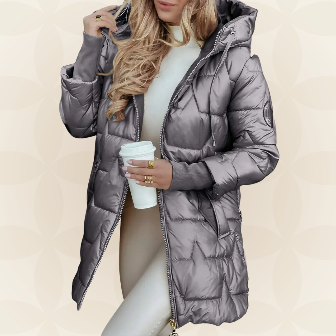 Close-up detail of the padded design on a pink hooded winter jacket, emphasizing the texture.