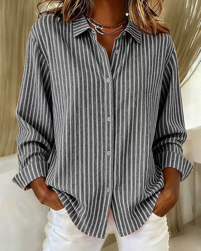 Lifestyle shot of the Nina relaxed fit shirt worn casually, emphasizing its freedom of movement.