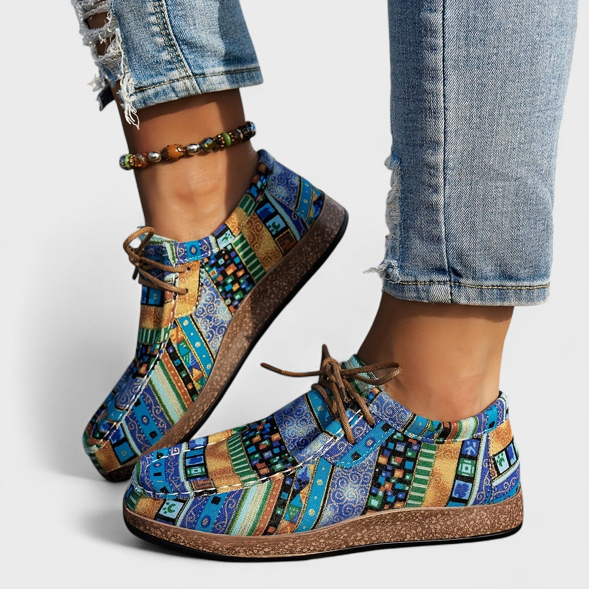 Rear view of the Peridot orthopedic sneakers, showing the sole's grip and overall lightweight construction.