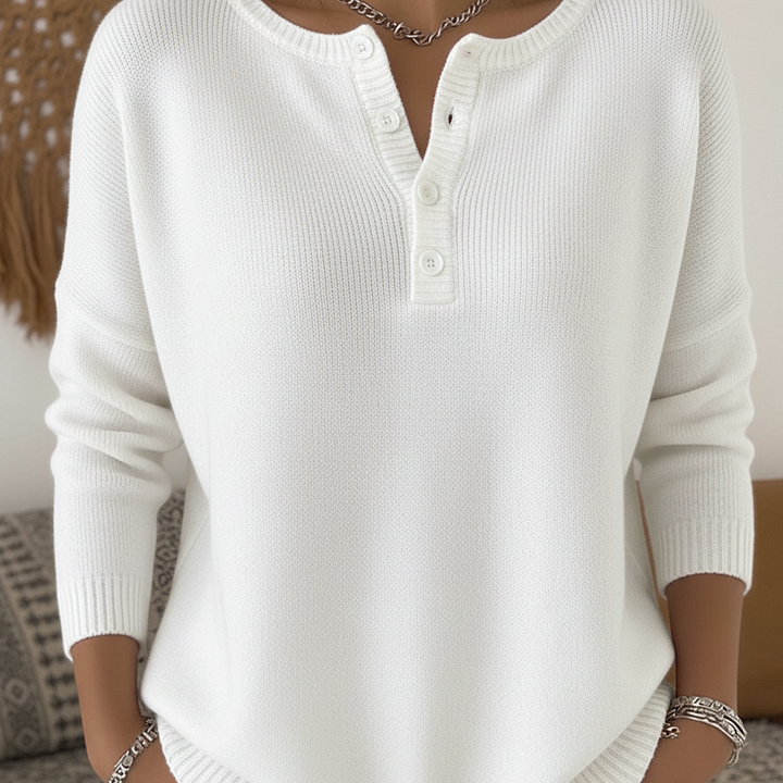Side profile of Romy comfort button-up pants, highlighting the flowing fabric and comfortable silhouette.