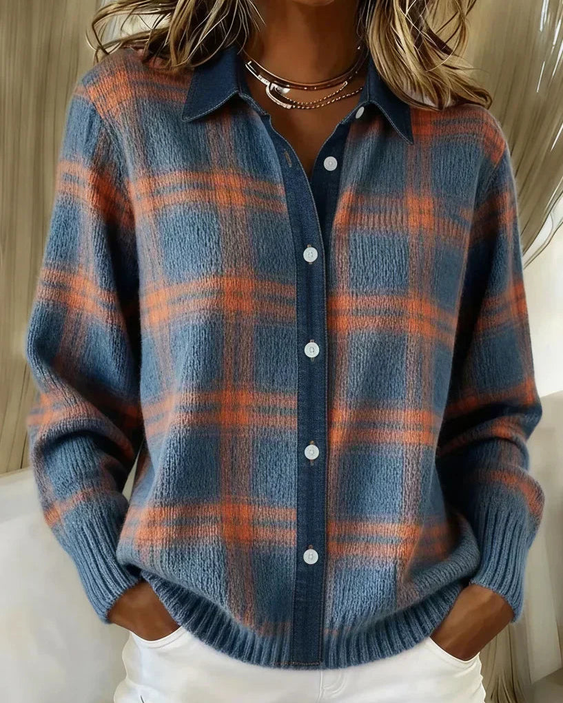 Front view of a Sable relaxed fit cardigan in a vibrant orange color, styled casually.