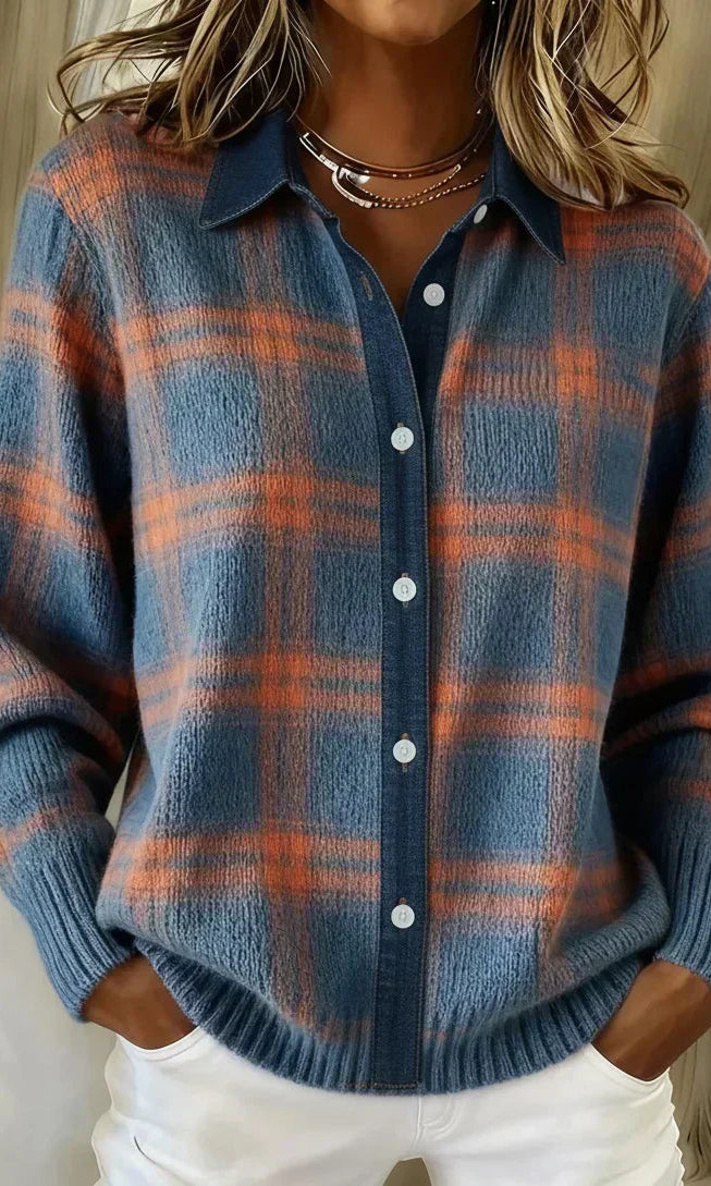 Front view of a Sable relaxed fit cardigan in a vibrant orange color, styled casually.