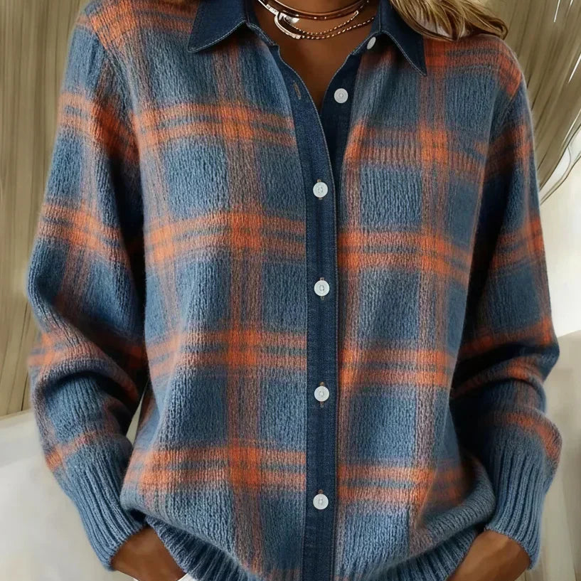 Front view of a Sable relaxed fit cardigan in a vibrant orange color, styled casually.
