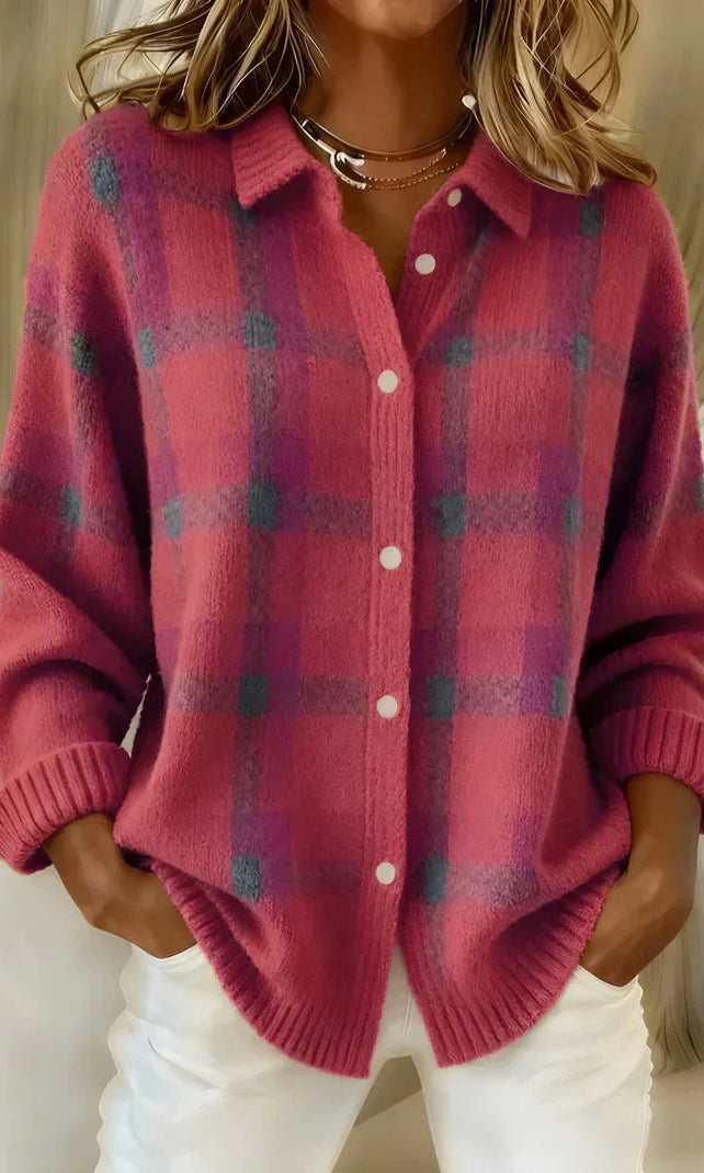 Back view of the orange Sable relaxed fit cardigan, highlighting its relaxed silhouette.