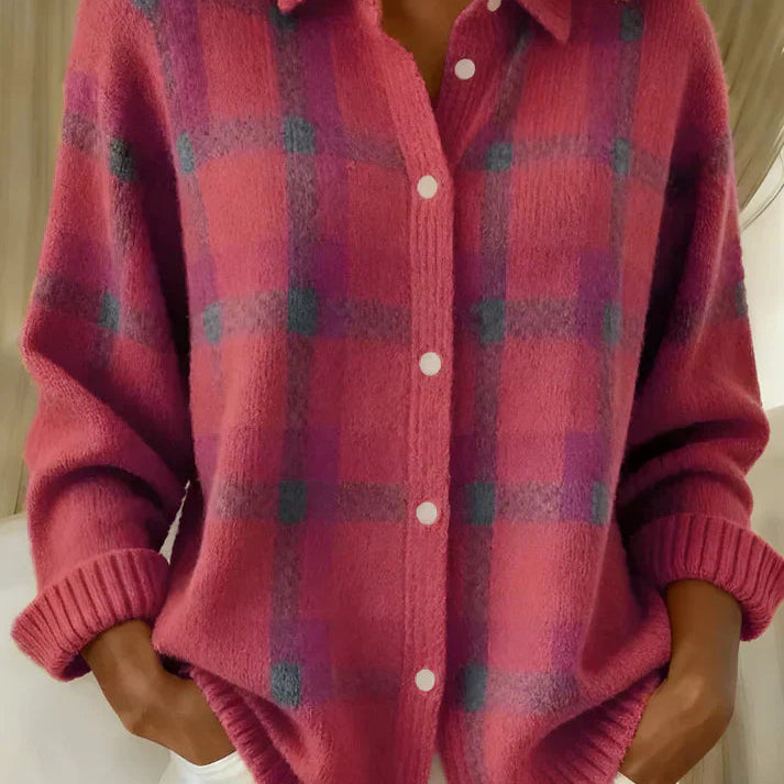 Back view of the orange Sable relaxed fit cardigan, highlighting its relaxed silhouette.
