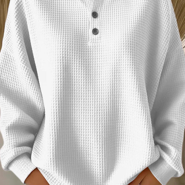 Close-up detail of the button closure and visible texture on the comfortable everyday shorts.
