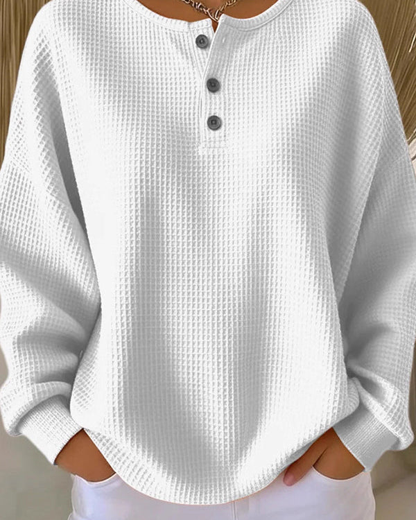 Close-up detail of the button closure and visible texture on the comfortable everyday shorts.
