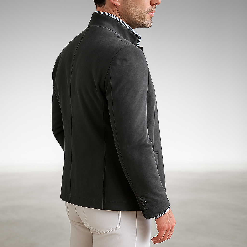 Close-up of the two-button closure and functional flap pocket on the yellow Silas tailored modern blazer, highlighting design details.