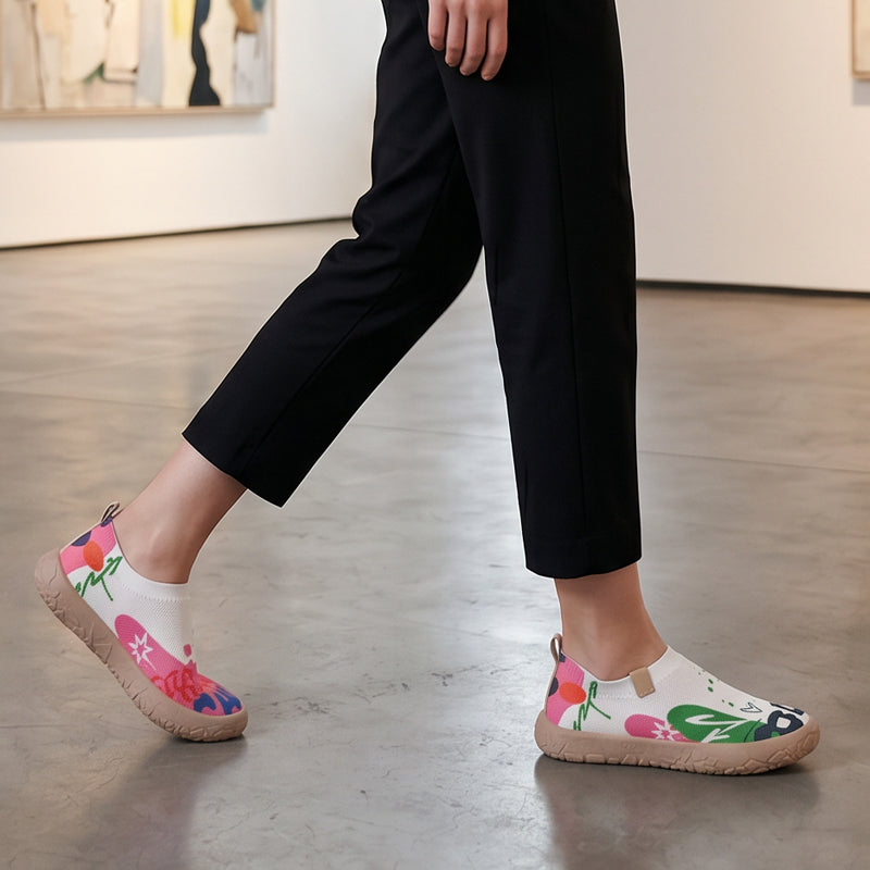 Side profile of a Suri artistic slip-on shoe, highlighting the flexible sole and laceless design