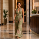A model wearing the chic black Sabina women's jumpsuit in a relaxed, casual setting, demonstrating versatility.