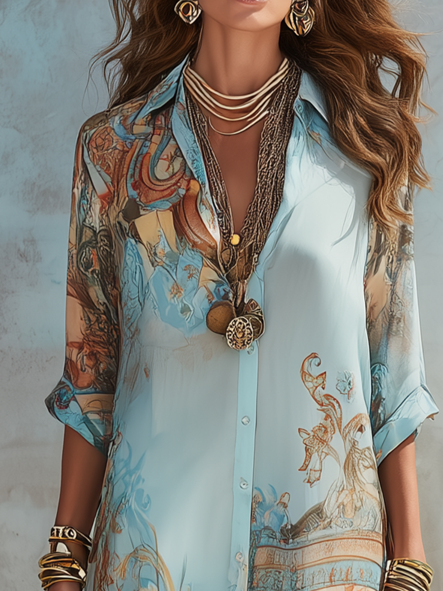Detail shot of the soft collared neckline and easy rolled short sleeves of the sophisticated maxi dress.