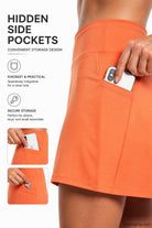 The hemline and leg opening of the light gray active skort, designed for comfort.