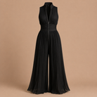 Lower half of the wide-leg women's jumpsuit, illustrating the generous movement and comfortable fit.