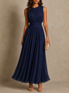 Full front view of the elegant Frida ruched waist maxi dress in a vibrant color, showcasing its flowing design.