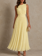 Back view of the breathable chiffon dress, emphasizing the clean lines and comfortable silhouette from behind.