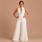 Overhead shot of the complete Sabina women's jumpsuit, displaying its pleated texture and overall cut.