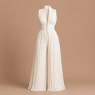 Stylish pairing of the Sabina women's jumpsuit with complementary accessories for a special evening occasion.